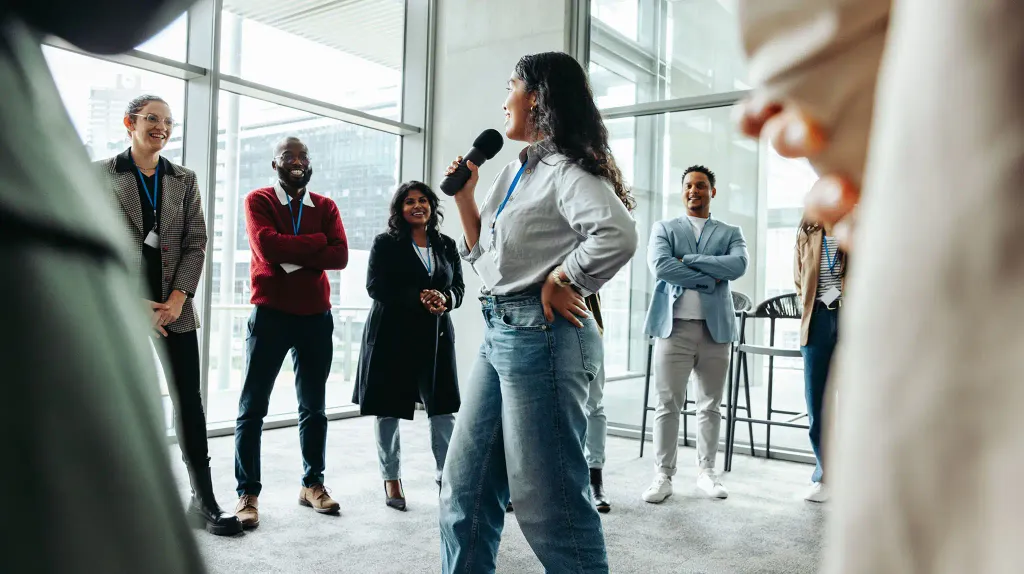 Business workshop with a diverse group of professionals engaged in team-building