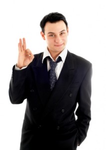 friendly businessman showing ok sign